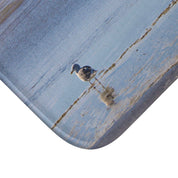 Shoreline Bird Reflecting in Calm Waters Bath Mat