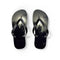Flip flops with a dark, moonlit forest silhouette.