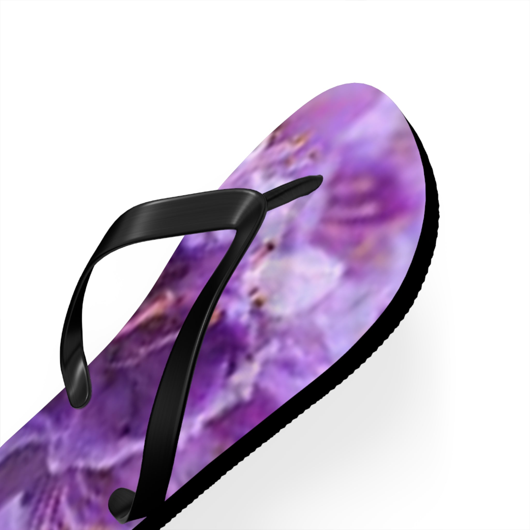 Purple floral pattern flip-flop with black straps.