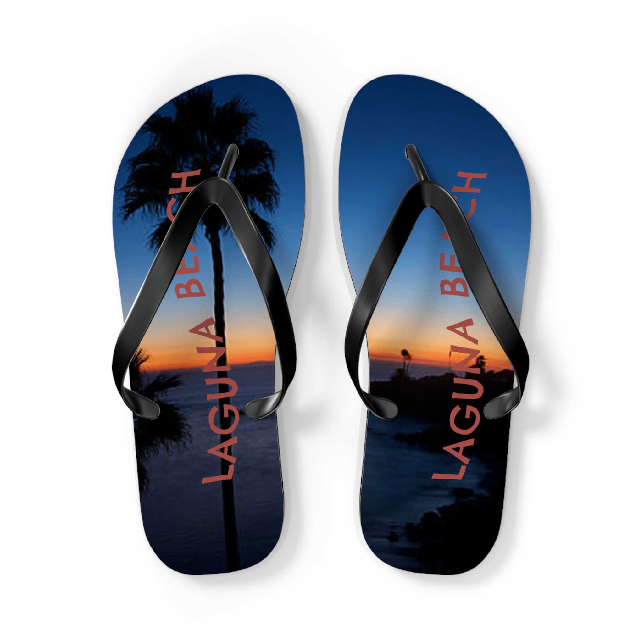Flip-flops with a Laguna Beach sunset and palm tree graphic.