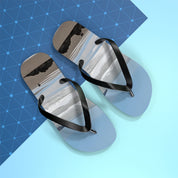 Flip-flops with a beach scene and a blue grid background.