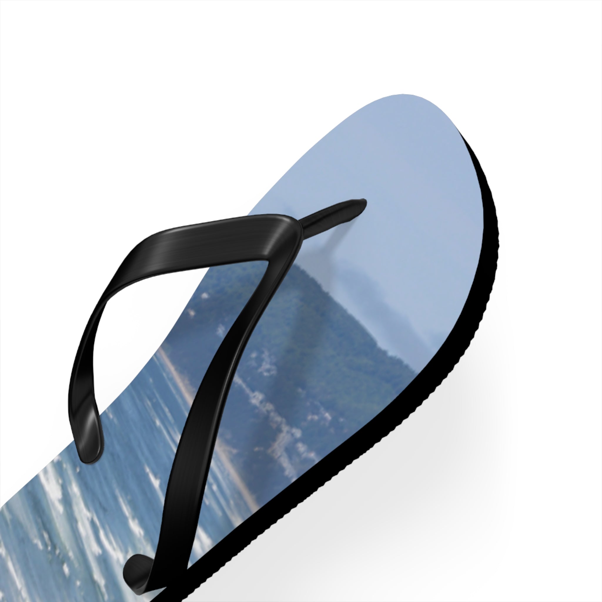 Flip flop with ocean and beach landscape design.