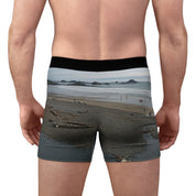 Men's boxer briefs with a beach scene and ocean waves.
