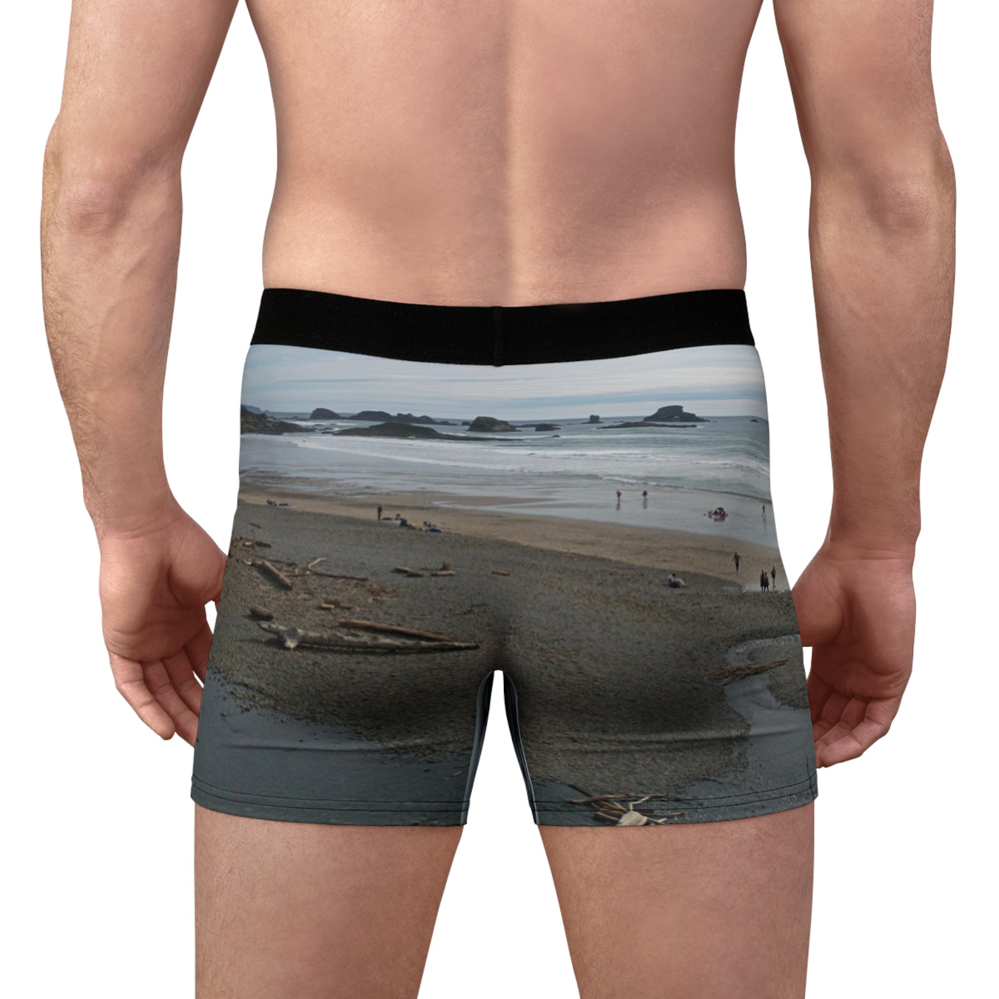 Men's boxer briefs with a beach scene and ocean waves.