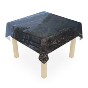 Tablecloth with a forest stream reflection scene.