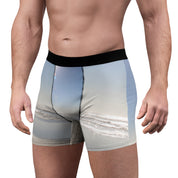 Men's boxer briefs with a beach and ocean wave graphic print.