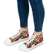 High-top sneakers with a colorful floral print, worn by a person in jeans.