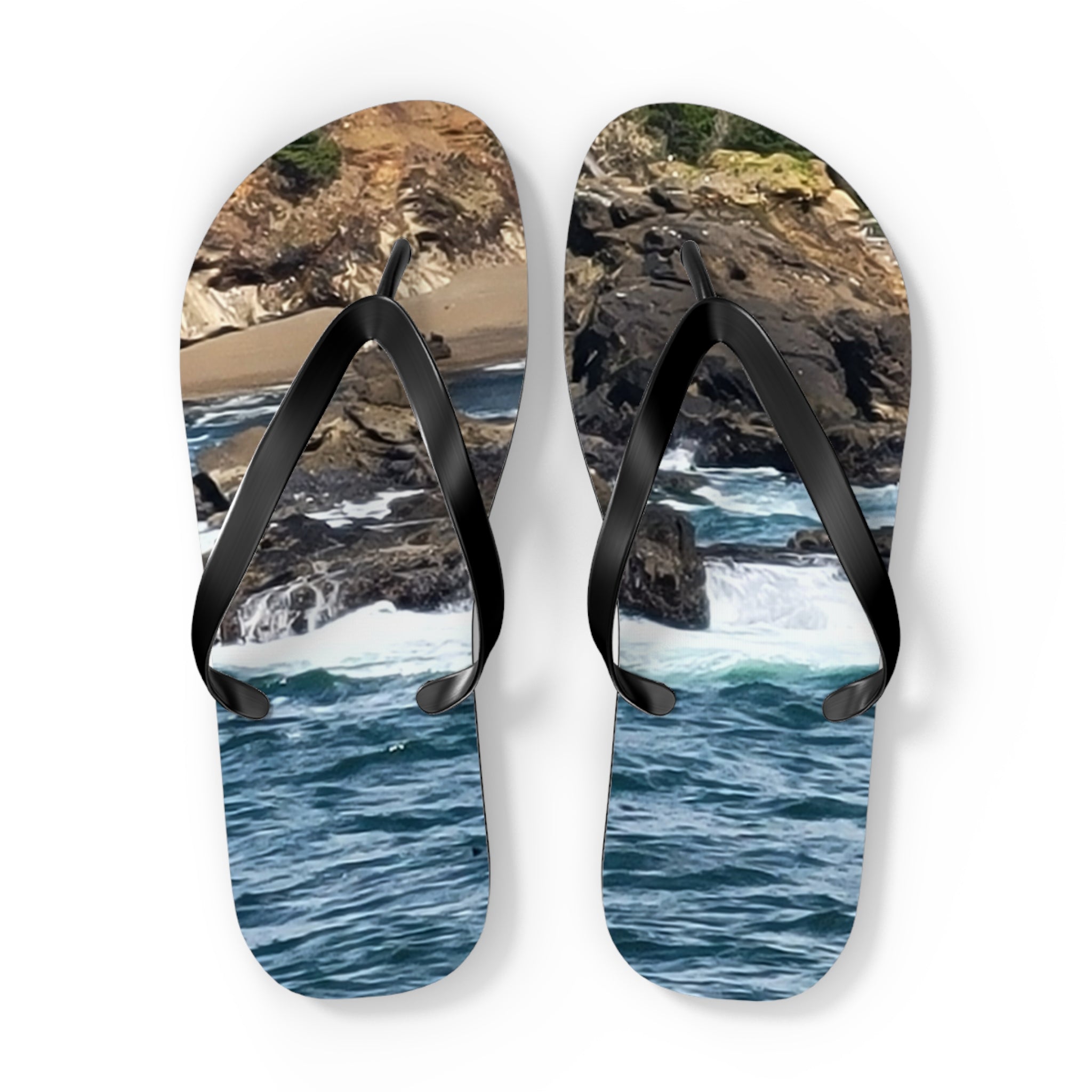 Flip-flops with ocean waves and rocky coastline design.