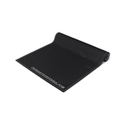 Black yoga mat with white stitching and JKCREATIONFINDS.COM logo.