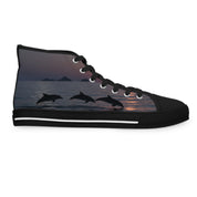 High-top sneakers with leaping dolphins at sunset graphic.