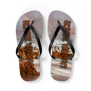 Flip-flops with "Laguna Beach" text on a beach landscape design.