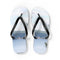 Flip-flops with a serene lake and forest landscape printed on the soles.