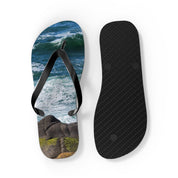 Flip-flops with ocean waves and rocks printed on the soles.