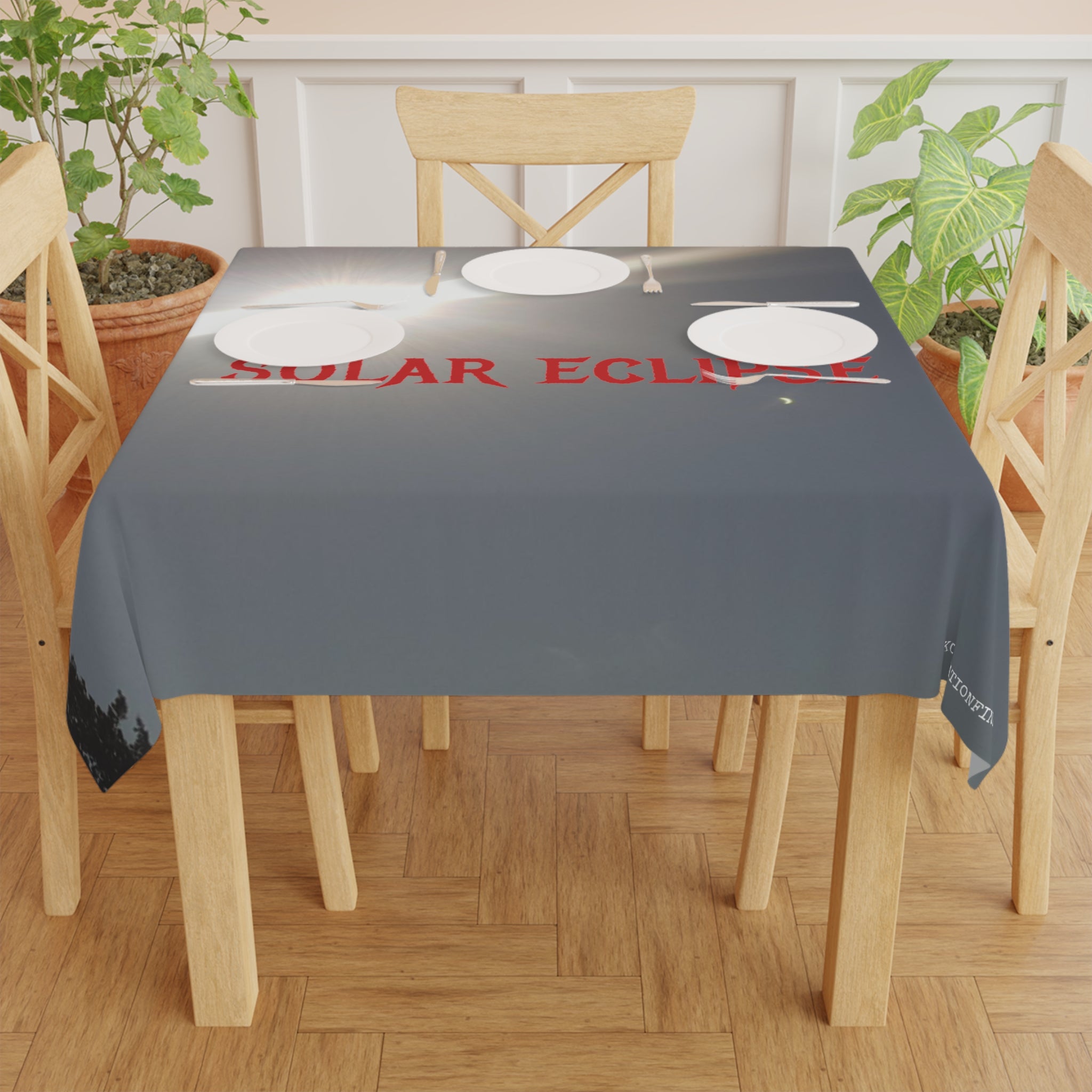 Tablecloth with a solar eclipse graphic and "SOLAR ECLIPSE" text.