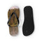 Flip flops with a forest and lake scene on one, black sole on the other.