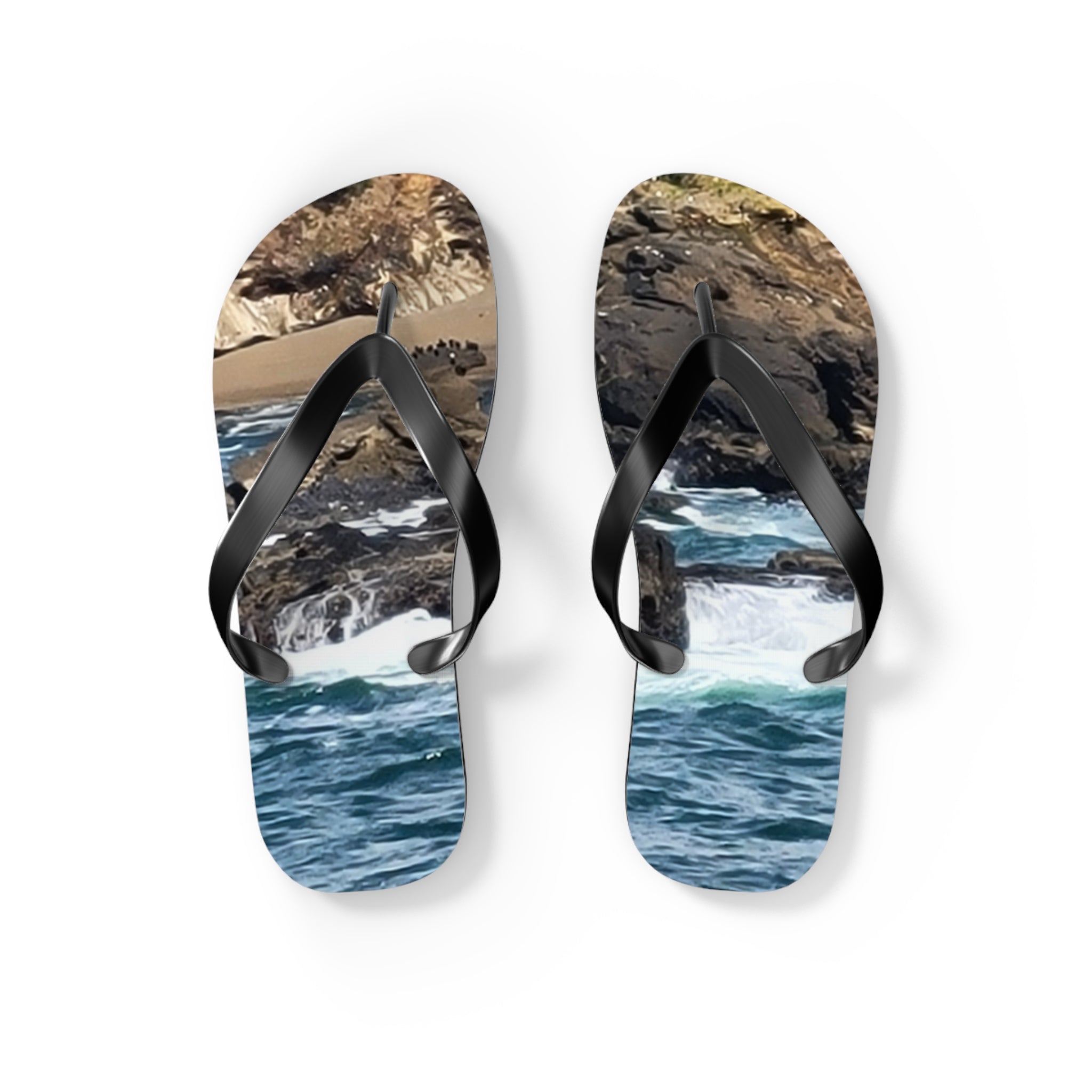 Flip-flops with ocean waves and rocky shore pattern.