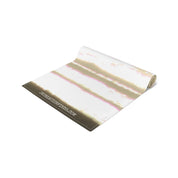 Rolled yoga mat with light brown and pink striped pattern.