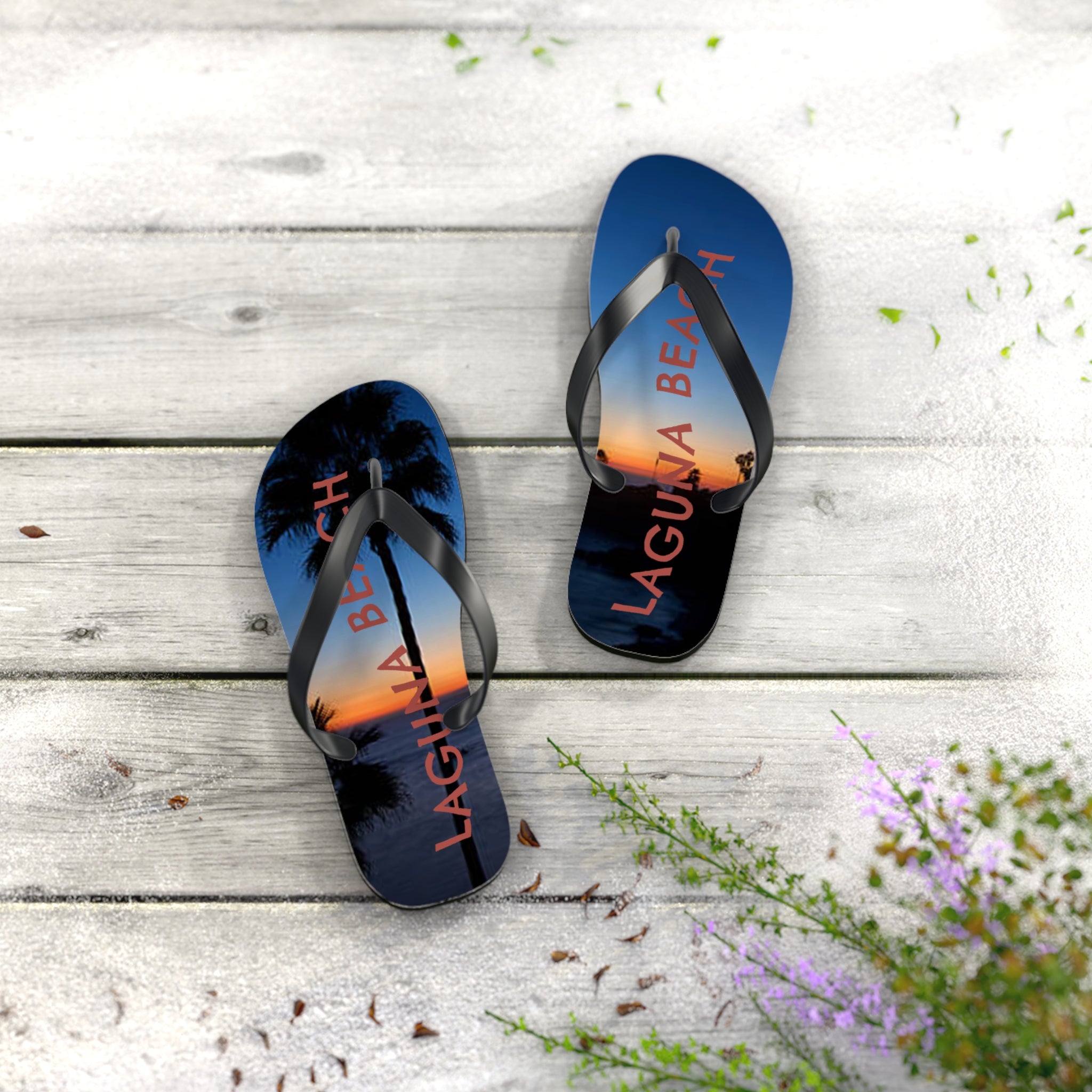 Laguna Beach flip-flops with sunset scene and palm trees.