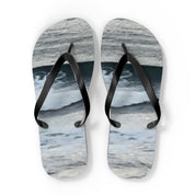 Flip flops with a marbled blue and gray design.