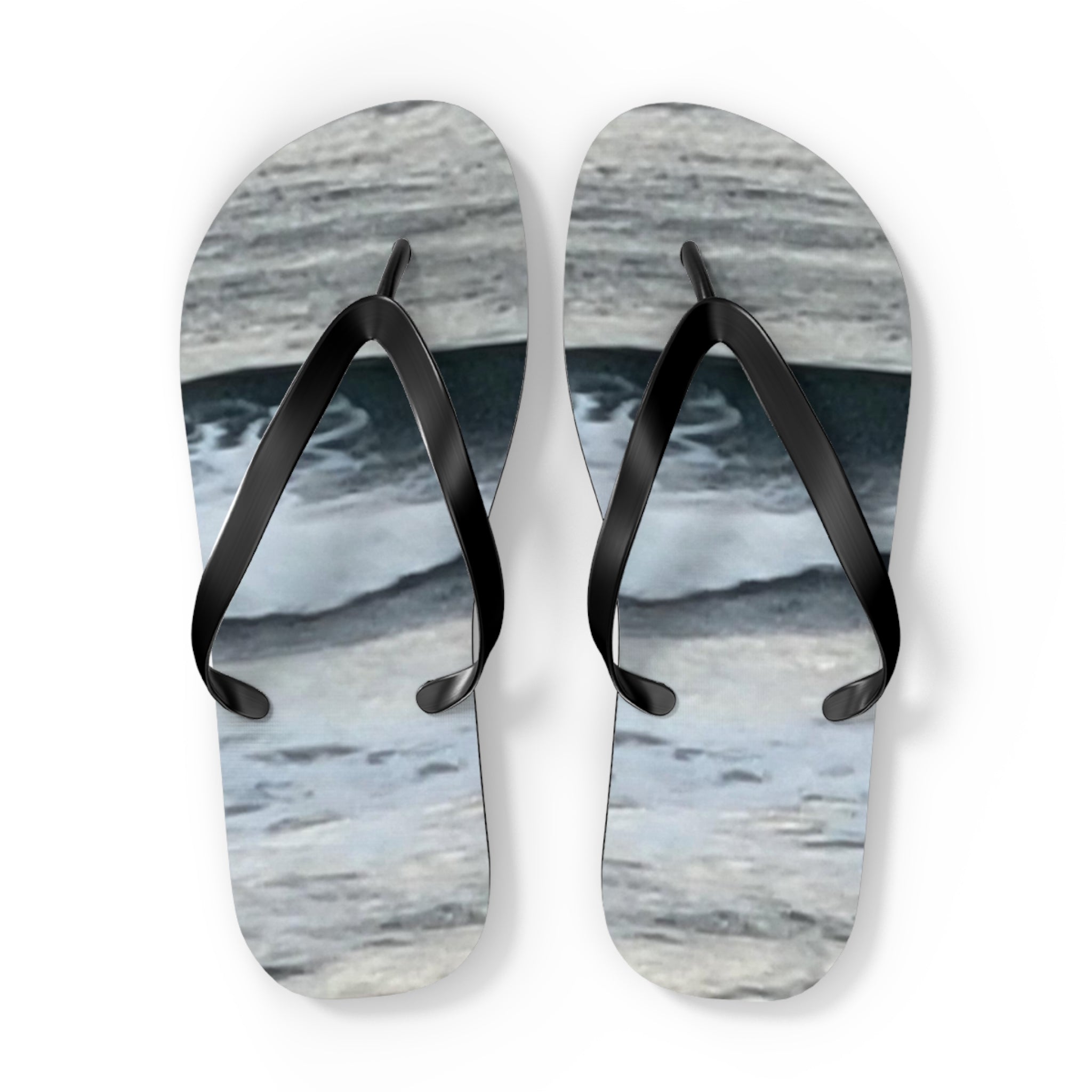 Flip flops with a marbled blue and gray design.