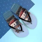 Flip flops featuring a lighthouse and ocean scene with a blue grid pattern.