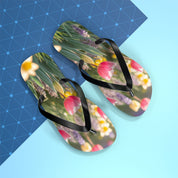 Flip-flops with a floral pattern featuring pink tulips and yellow daffodils.