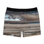 Boxer briefs with a dry, barren landscape scene.