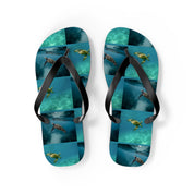 Flip-flops with a repeating pattern of sea turtles swimming in clear water.