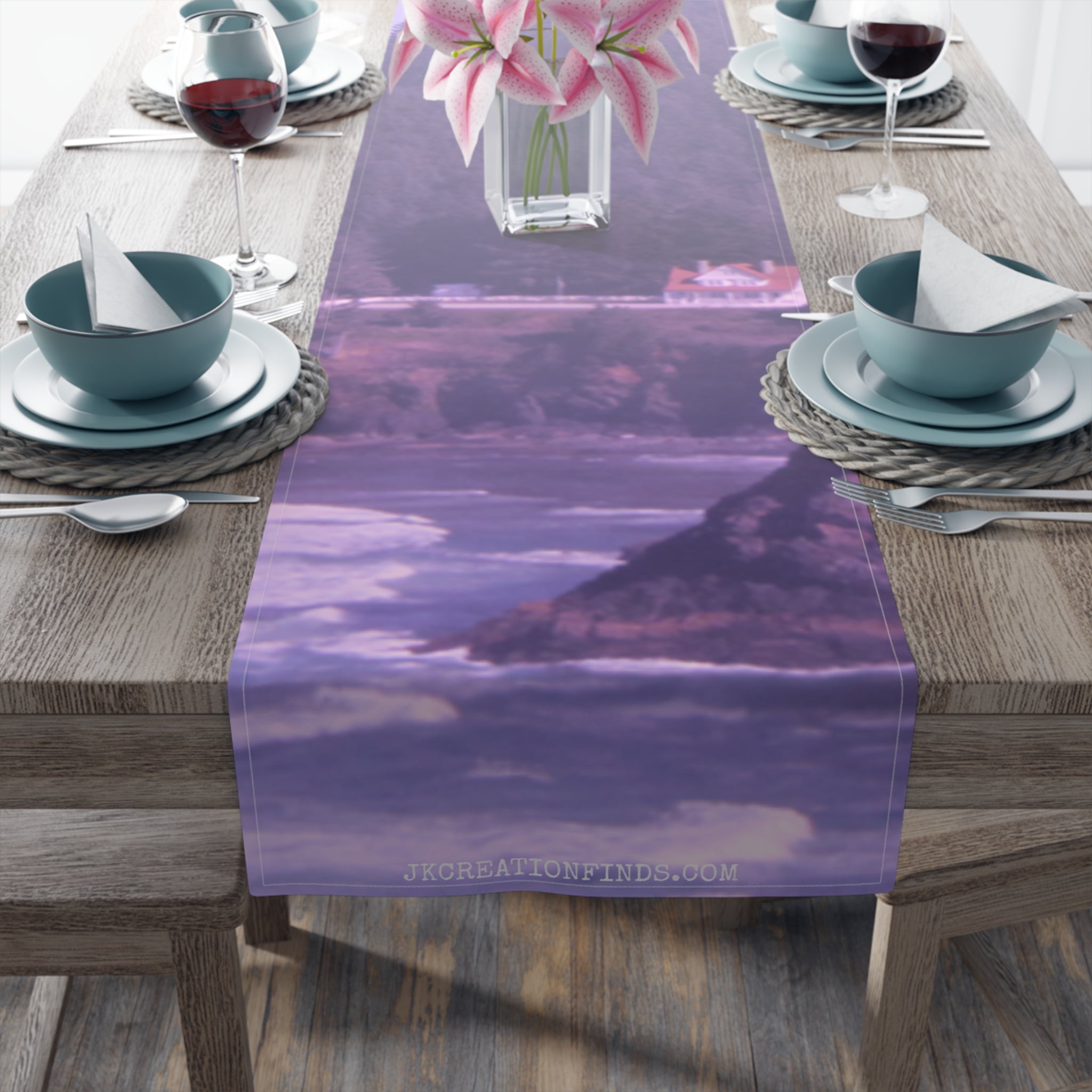 Table runner with a purple landscape and the text "JKCREATIONFINDS.COM".