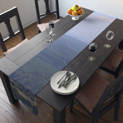 Table runner with a landscape photo of trees and a distant horizon.