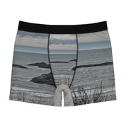 Men's boxer briefs with a rocky ocean seascape print.