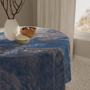 Round tablecloth with a mountainous landscape design.