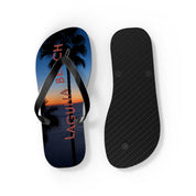 Black flip-flops with "LAGUNA BEACH" and palm tree silhouette at sunset.