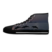 High-top canvas shoe with three leaping dolphins at sunset.