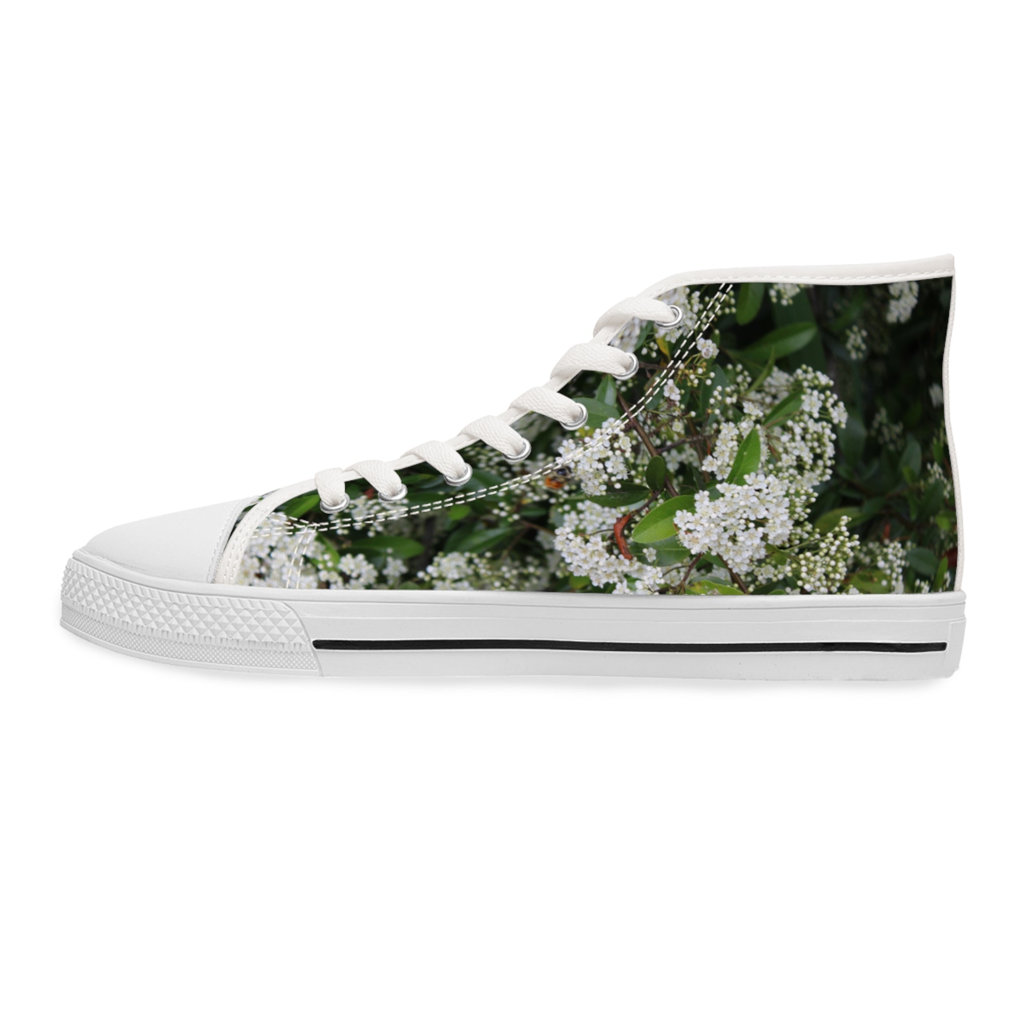 White high-top sneaker with a white floral pattern on the side.