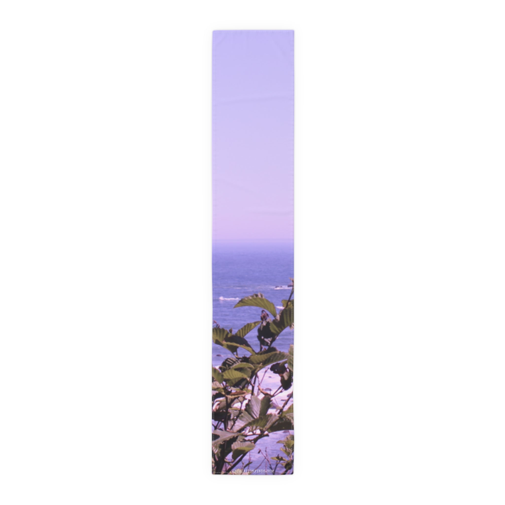 Lavender scarf with seascape and green leaves.