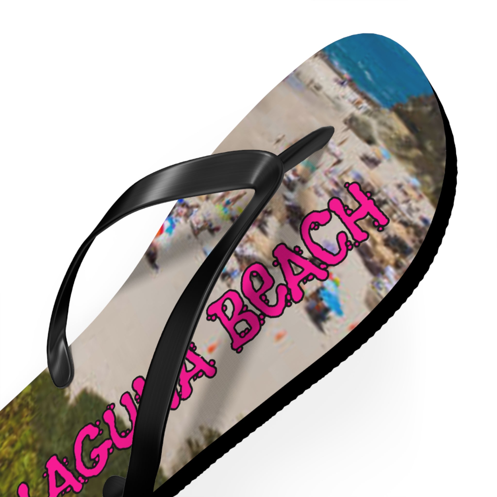 Black flip-flop with "LAGUNA BEACH" text and a crowded beach scene.
