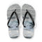 Flip-flops with a wave pattern on a white background.