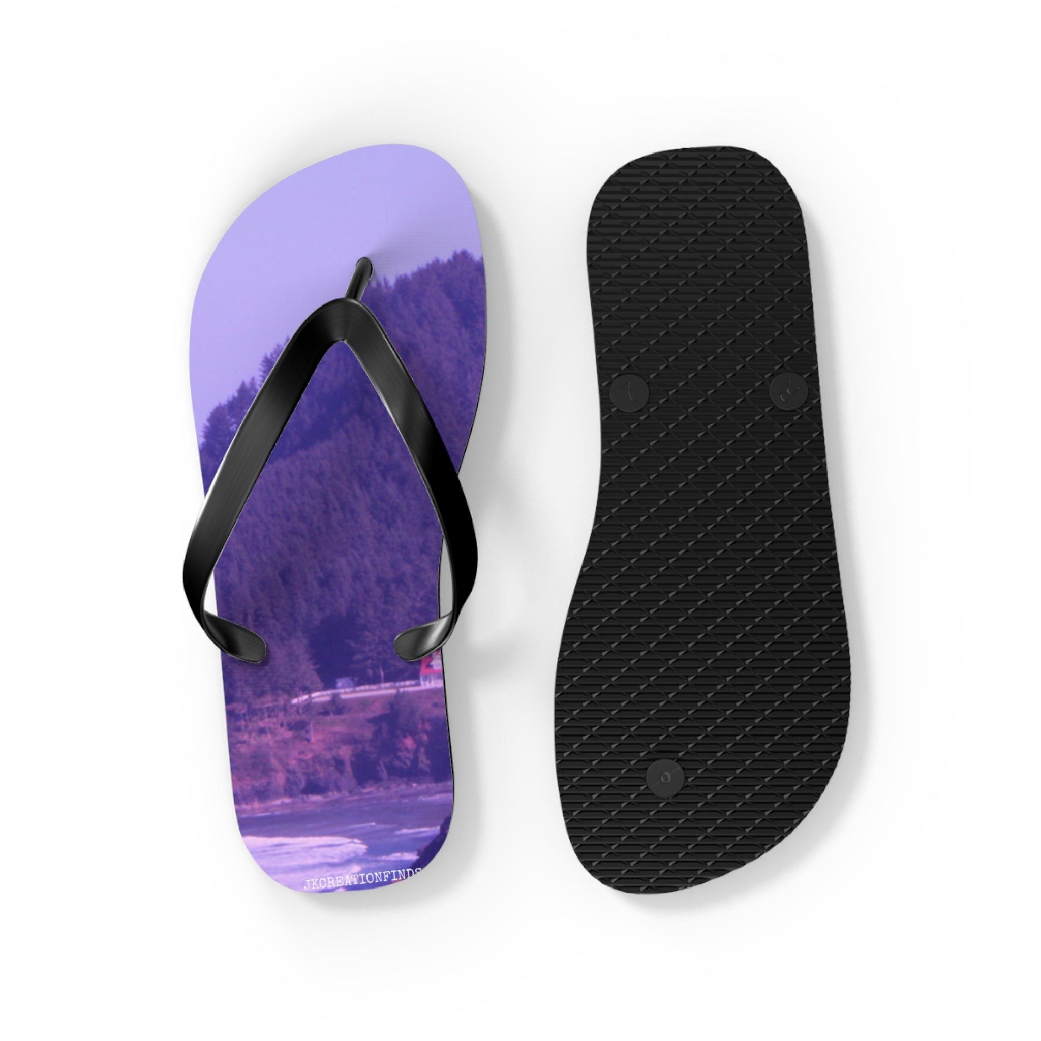 Flip-flops with a scenic landscape of trees and water on the left strap.