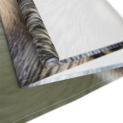 Rolled tapestry featuring a close-up of a cat's fur pattern.