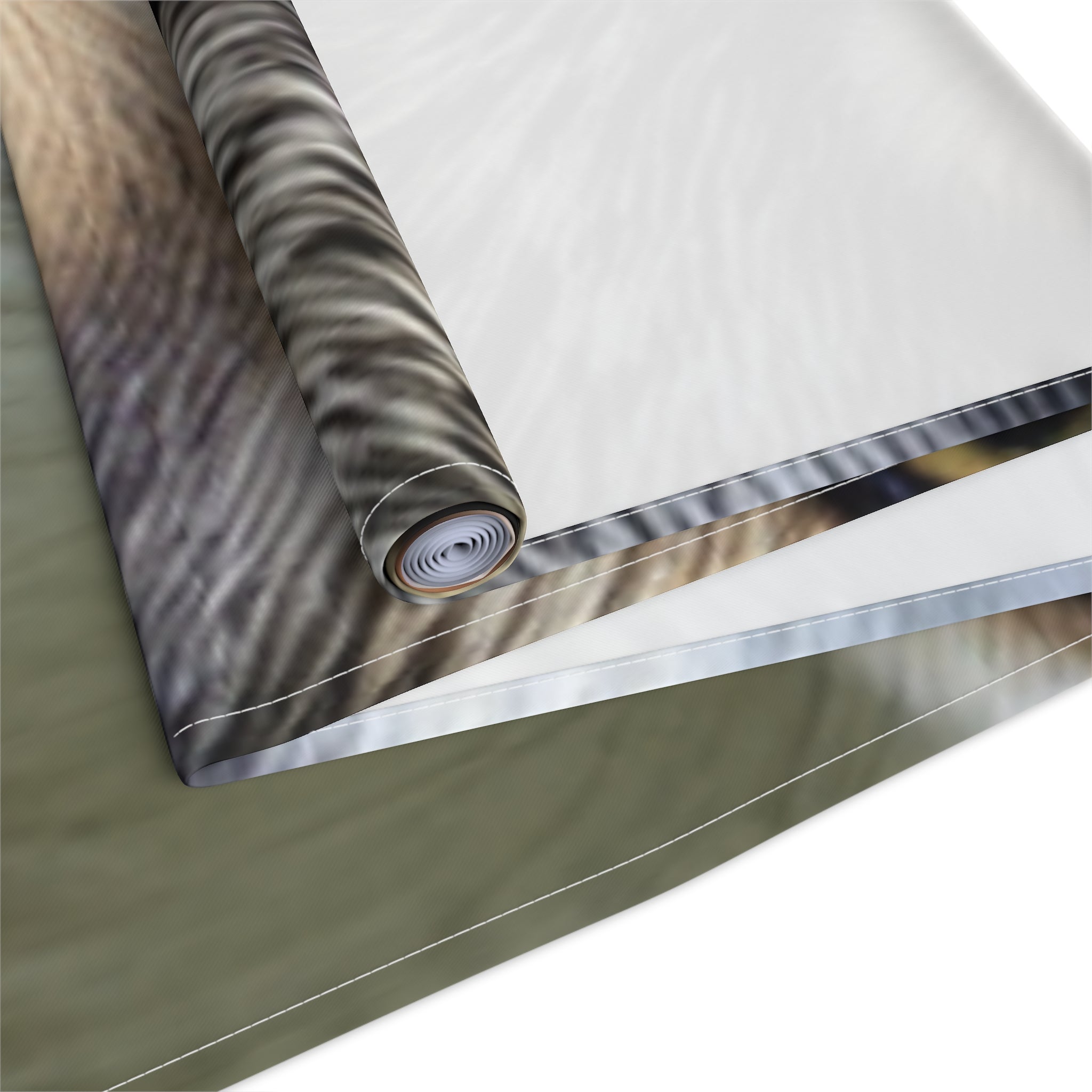 Rolled tapestry featuring a close-up of a cat's fur pattern.