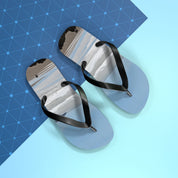 Flip-flops with a beach landscape design on a light blue background.
