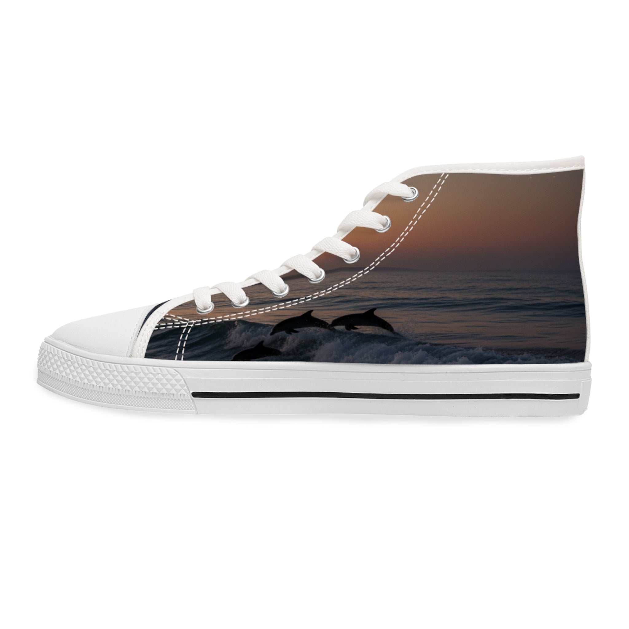 High-top sneakers with leaping dolphins at sunset on the ocean.
