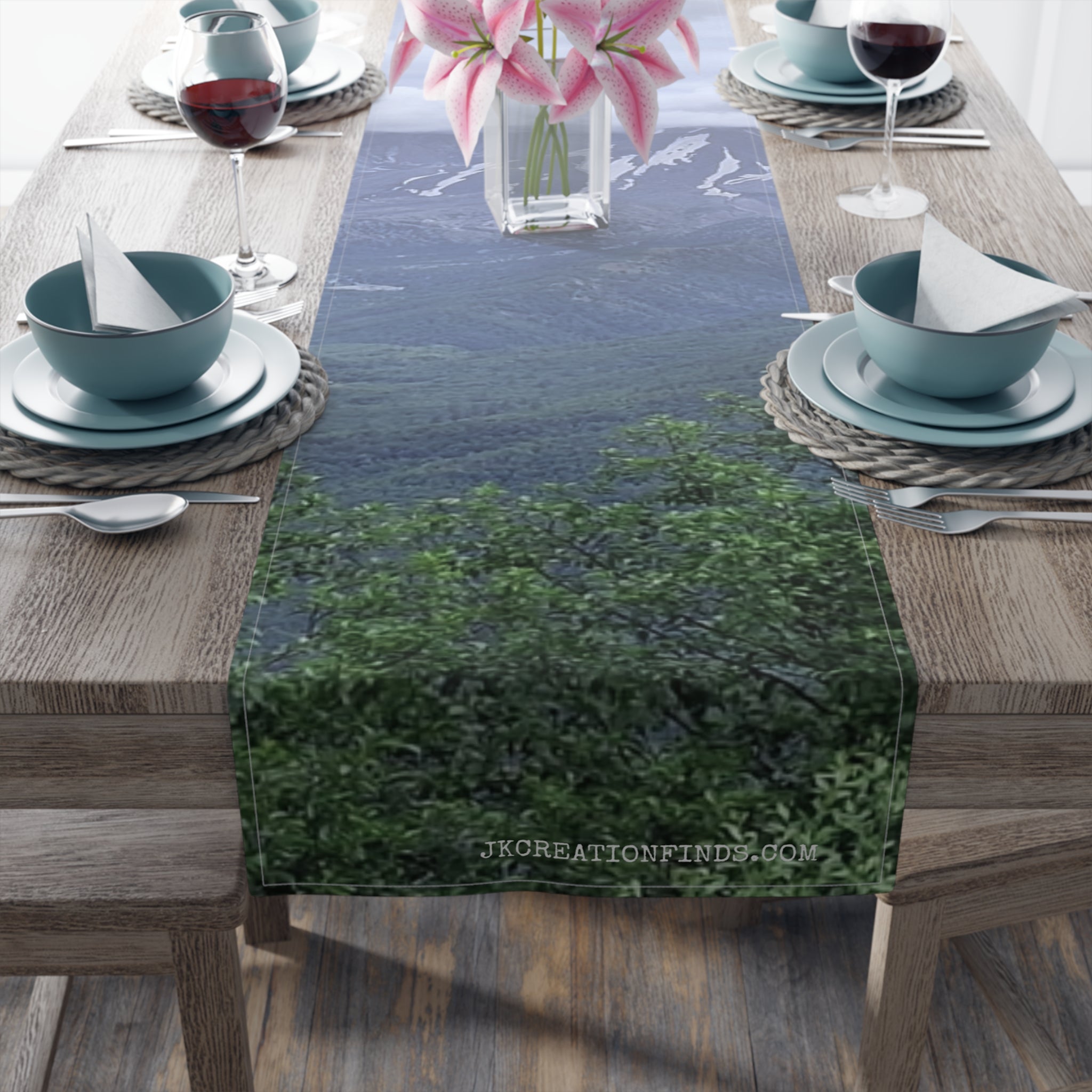 Table runner with a misty forest landscape and "JKCREATIONSFNDS" text.