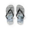 Flip-flops with wave pattern on straps and soles, isolated on white.