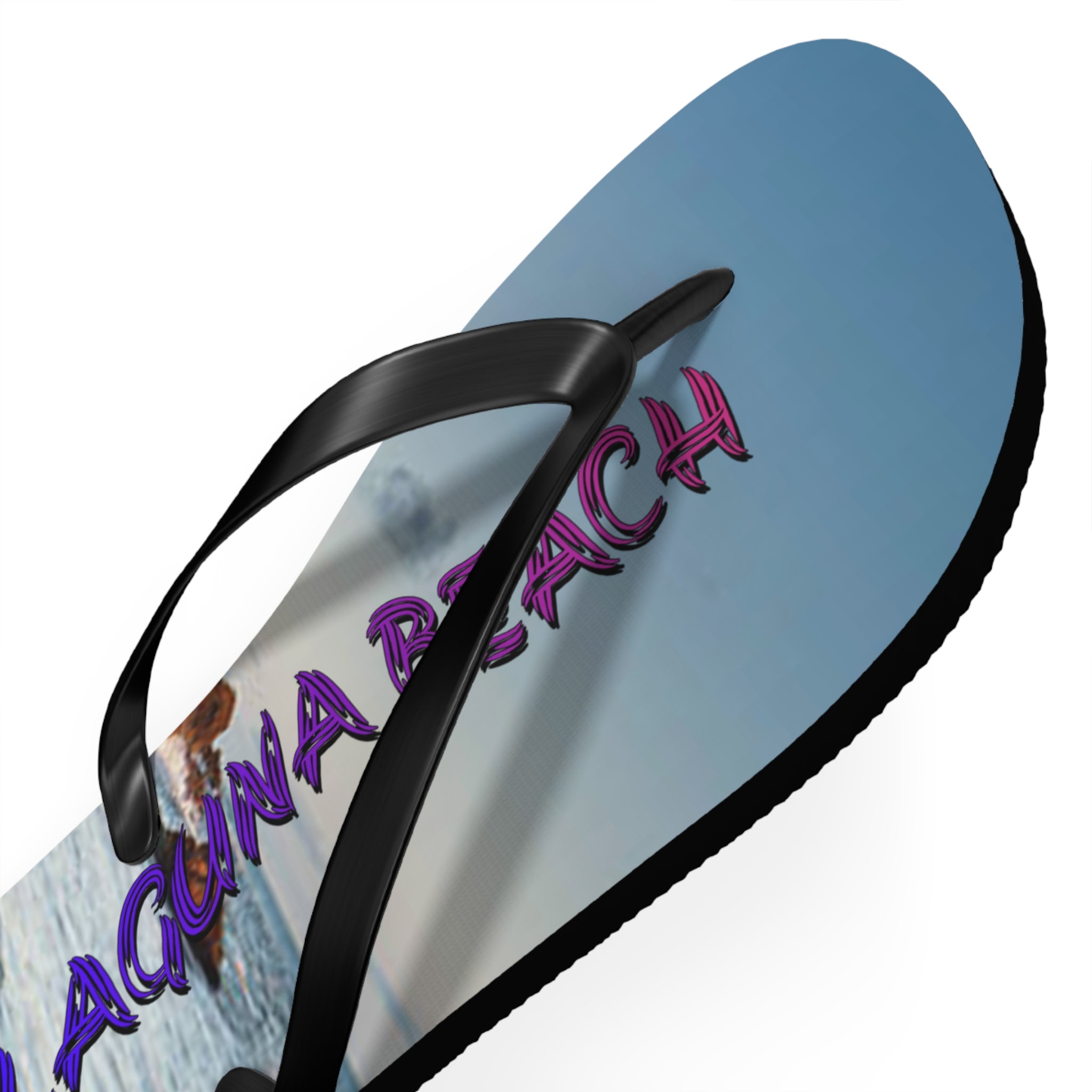 Flip-flop with "Laguna Beach" text and beach scene.