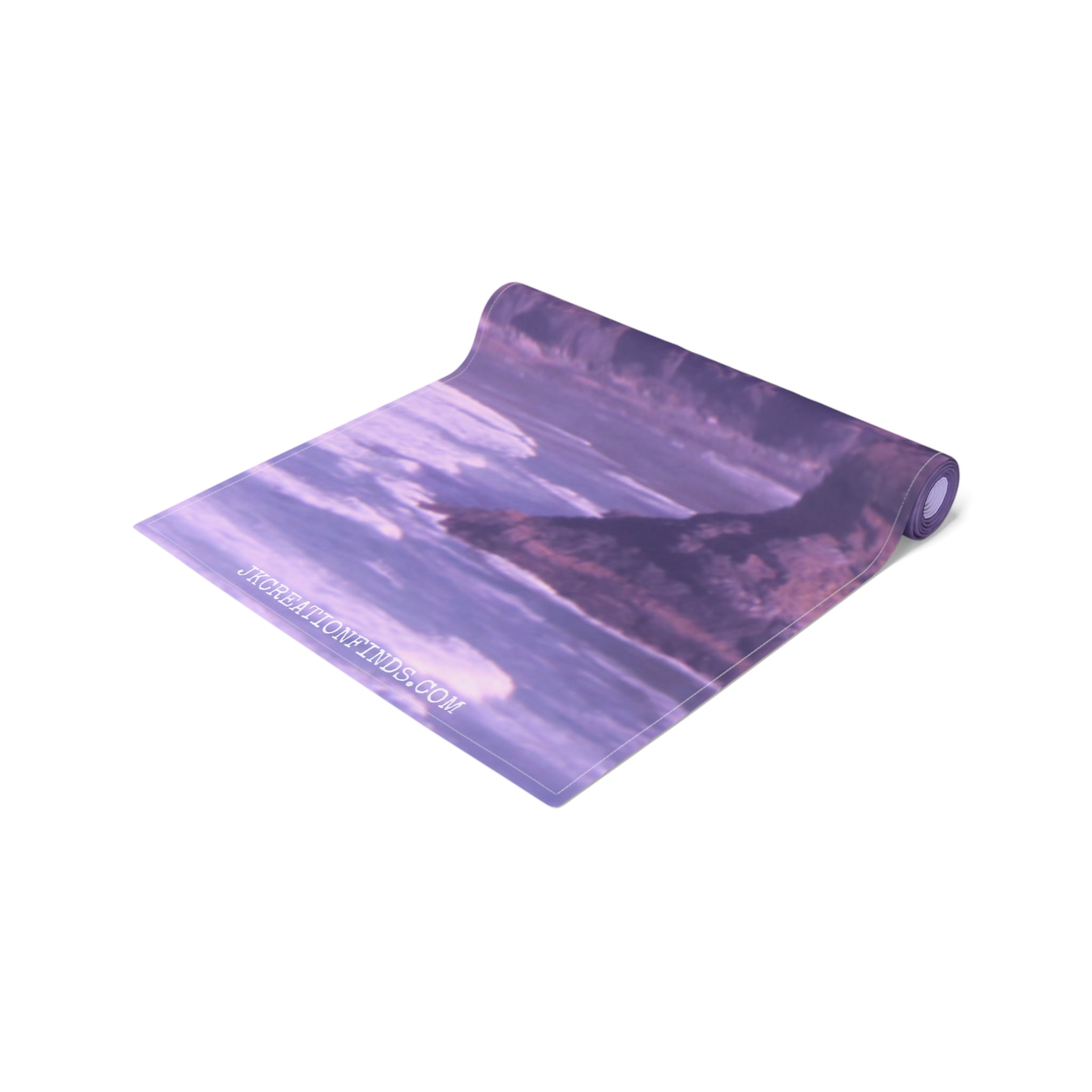 Purple and white abstract wave pattern yoga mat rolled on a white background.