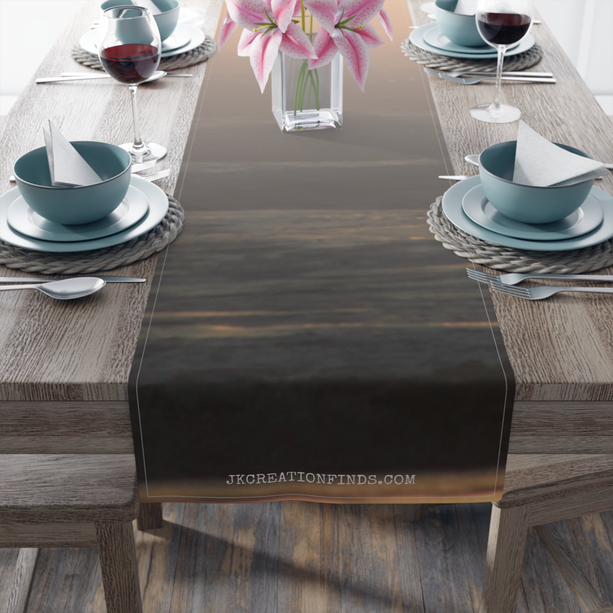Ocean sunset table runner with "JKCREATIONFIND.COM" text.