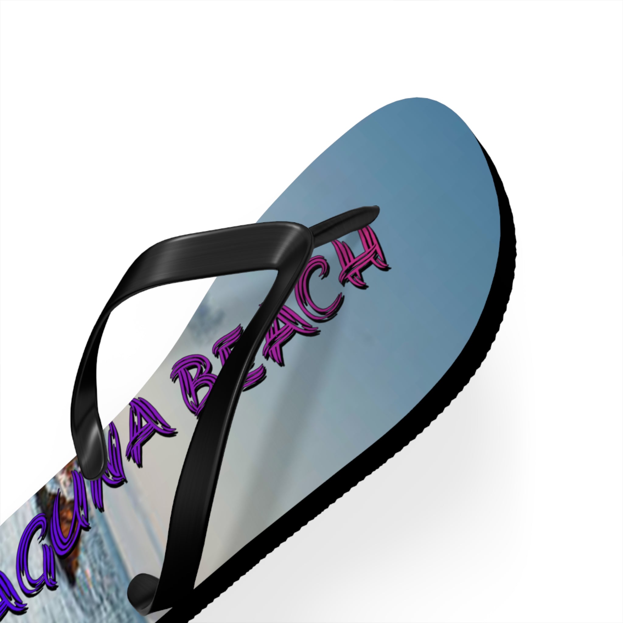 Flip-flop with "Laguna Beach" text over a beach scene.