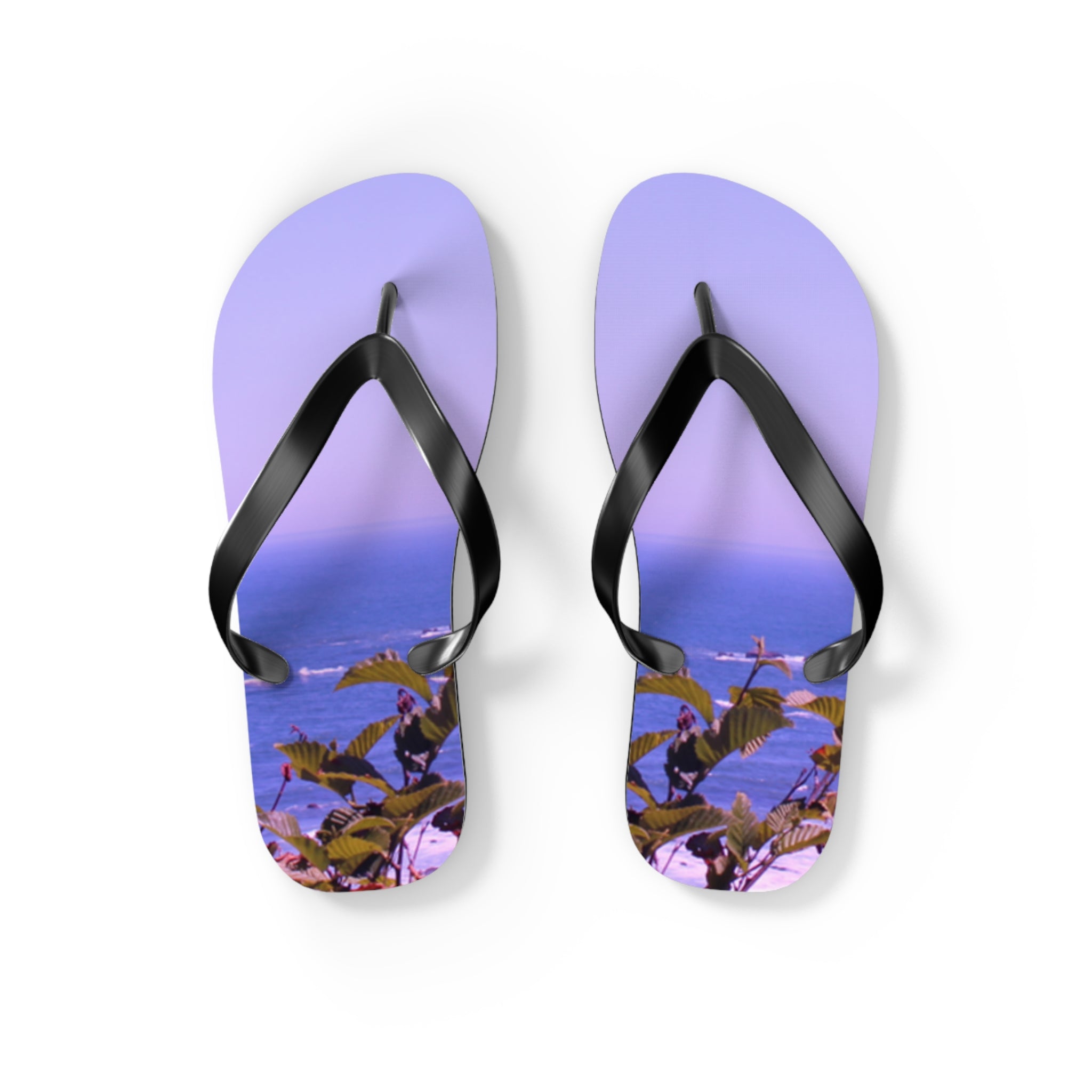 Lavender flip-flops with a seascape and foliage design.